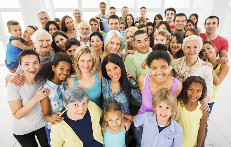 Large group of happy people standing embraced and looking at the camera. [url=http://www.istockphoto.com/search/lightbox/9786738][img]http://dl.dropbox.com/u/40117171/group.jpg[/img][/url]